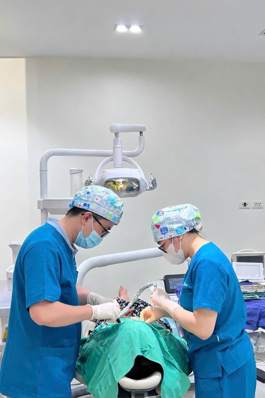Bright modern dental treatment floor with multiple chairs and clinical team at AM Procare